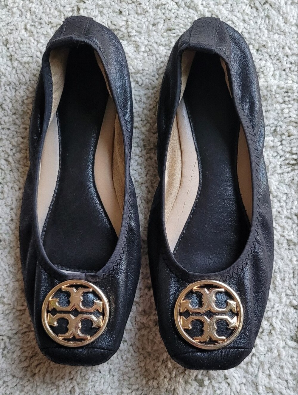 Black Ballet Flats With A Stunning Gold Emblem 5 1/2